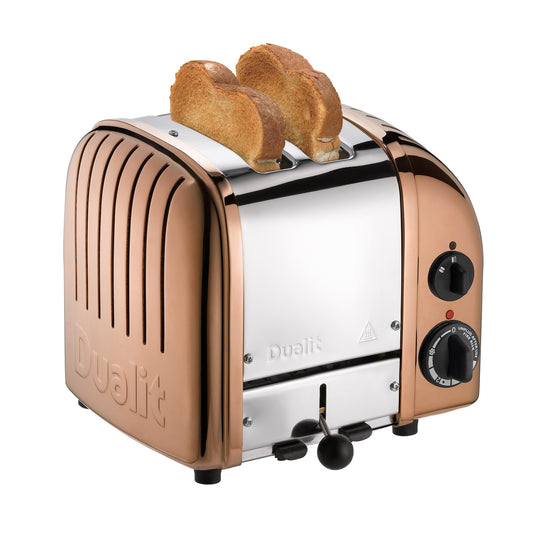 Dualit Classic Toaster Copper: stylish 2-slice toaster, durable build, replaceable heating elements, consistent toasting performance.